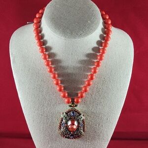 RETIRED HEIDI DAUS BRONZ COLECTION NECKLACE, NEVER BEN USED. 20" LONG .